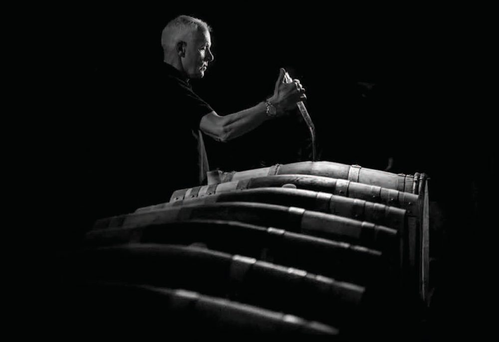 Plate VI &mdash; Topping up the barrels